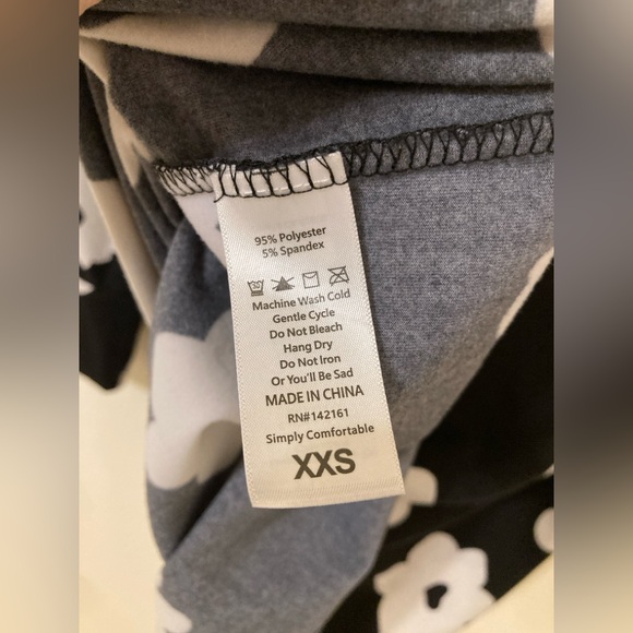 LuLaRoe Black and Off-White Floral Long Sleeve Top - Picture 6 of 7